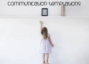 Child reaching for a tablet on a high shelf, illustrating communication temptations in learning and development