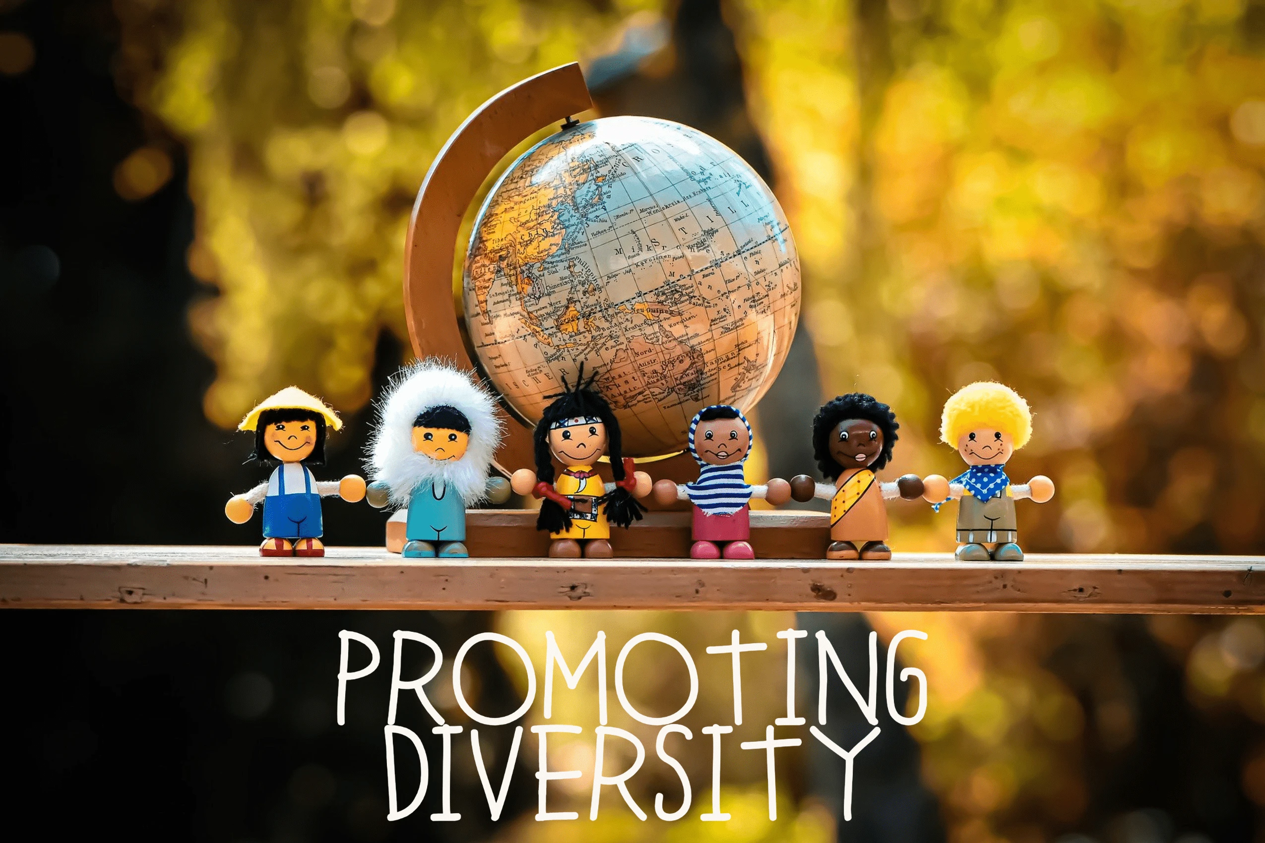 Colorful wooden dolls from different cultures standing in front of a globe with text 'Promoting Diversity'