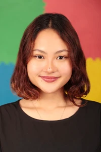 Studio Session-20354 Smiling Mariz against a colorful background